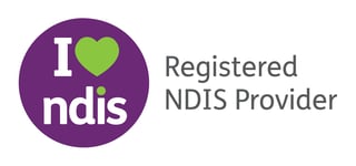 I Love NDIS Provider logo featuring purple circle with white text and green heart